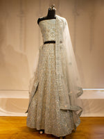 White Sequin Splendor: Bridal Lehenga with Intricate Detailing